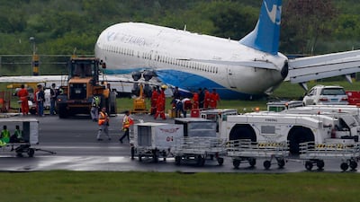 A Xiamen Air Boeing 737-800 kidded off the runway while landing in Manila on August 16, 2018. AP Photo