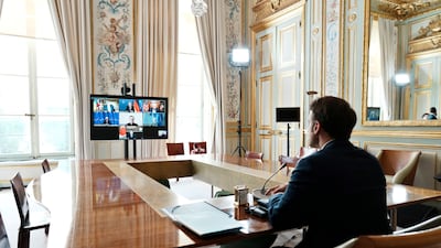 French President Emmanuel Macron takes part in a video conference of G7 leaders on Ukraine. Photo: EPA