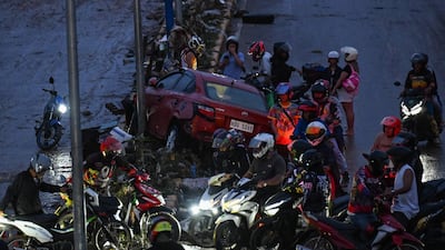 A wrecked car in Mandaue. AFP