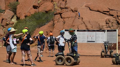 Hundreds of tourists flocked to Uluru for one last chance to scale the sacred red monolith ahead of a climbing ban. AFP