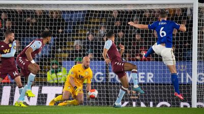 Leicester City's Jonny Evans (R) in action with Aston Villa's Pepe Reina. EPA