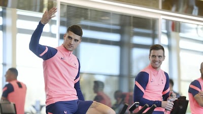 Erik Lamela and Giovani Lo Celso of Tottenham Hotspur during training session at Tottenham Hotspur Training Centre on April 23, 2021 in Enfield, England.