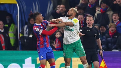 Newcastle's Joelinton clashes with Crystal Palace's Michael Olise. Reuters