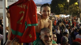 Moroccan football supporters gather in Rabat to celebrate the team's last-16 win over Canada. AFP