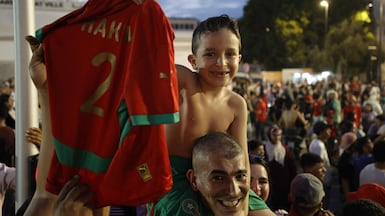 Moroccan football supporters gather in Rabat to celebrate the team's last-16 win over Canada. AFP