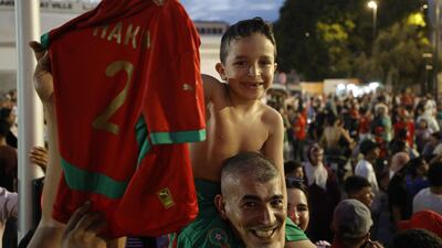 Moroccan football supporters gather in Rabat to celebrate the team's last-16 win over Canada. AFP