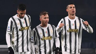 Left to right: Rodrigo Bentancur, Arthur and Cristiano Ronaldo. AFP