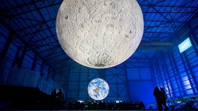 Artist Luke Jerram's Museum of the Moon and Gaia is displayed at the National Renewable Energy Centre in Blyth, north-east England. Getty Images