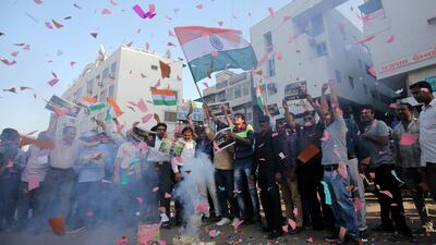 People celebrate before the release of Indian Air Force pilot, who was captured by Pakistan on Wednesday, in a street in Ahmedabad, India, March 1, 2019. Reuters