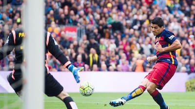 Luis Suarez of FC Barcelona shoots the ball past Pau Lopez of RCD Espanyol and scores his team’s second goal during the La Liga match between FC Barcelona and RCD Espanyol at Camp Nou on May 8, 2016 in Barcelona, Spain. (Alex Caparros/Getty Images)