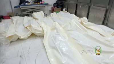 Body bags on the floor at Al Thawra Hospital. Reuters