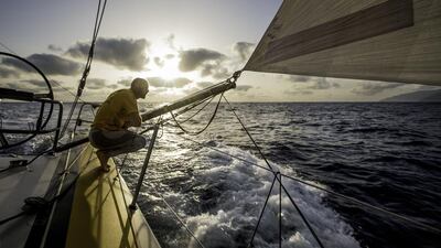 Abu Dhabi Ocean Racing skipper Ian Walker looks out to the sea as Azzam sails through the Atlantic. Matt Knighton / Abu Dhabi Ocean Racing / Volvo Ocean Race / October 19, 2014
