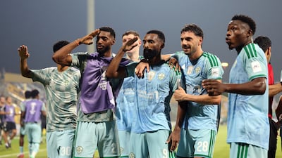 Feras Albrikan celebrates with teammates after scoring Al Ahli's third goal in their 3-1 AFC Champions League Elite win over Al Wasl in Dubai on October 12, 2026. Chris Whiteoak / The National