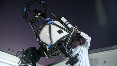 Astronomer Nezar Hezam Sallam during a Moon sighting for the start of Ramadan 2022 in Al Shahama. Khushnum Bhandari / The National