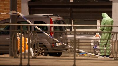 Police in the area where the shooting took place in the centre of Brussels. AP