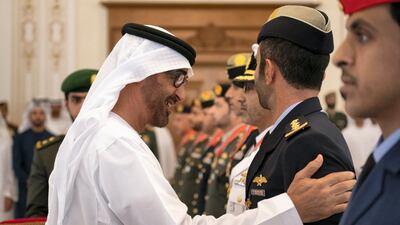 Sheikh Mohamed bin Zayed presents an Emirates Military Medals to members of the UAE Armed Forces, Ministry of Interior and Abu Dhabi Police during a Sea Palace barza.