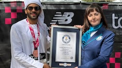 Sadique Ahamed being presented with a certificate for his achievement at the end of this year's London Marathon. Photo: Guinness World Records