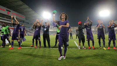 Omar Abdulrahman leads the celebrations after Al Ain reached the Asian Champions League final. Karim Jaafar / AFP