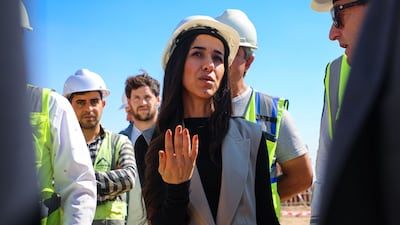 Nadia Murad visits one of the initiative's building projects in Sinjar in October 2022