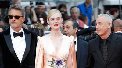 Pawel Pawlikowski, Elle Fanning and Robin Campillo attend the opening ceremony and screening of 'The Dead Don't Die' at the Cannes Film Festival on May 14, 2019. Reuters