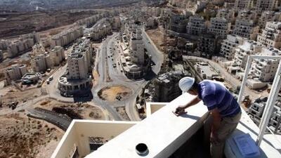 A construction worker at a site of a new housing unit in the east Jerusalem neighborhood of Har Homa.