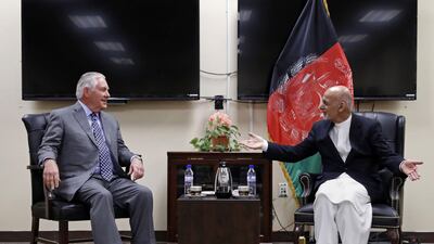 US secretary of state Rex Tillerson speaks with Afghan president Ashraf Ghani at the Bagram air base outside on October 23, 2017. Alex Brandon / AFP