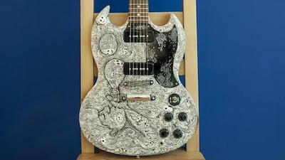 An SG Gibson guitar decorated by artist Kristy Anne Ligones from the Philippines titled Blow Bubbles On The Otherside. Antonie Robertson / The National