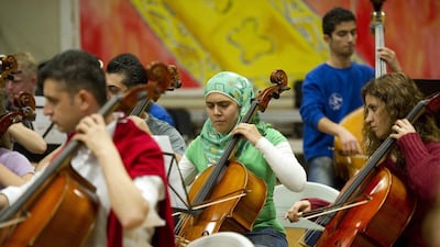 Members Tuqa Alwaeli and Sabat Hameed with the Tannenbusch School Orchestra, Bonn, in 2011.