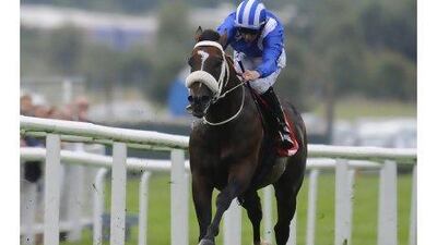 Paul Hanagan rides Soft Falling Rain at Newbury on Saturday. Alan Crowhurst / Getty Images