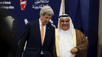 John Kerry with Bahrain's foreign minister, Sheikh Khalid bin Ahmed Al Khalifa, in Manama. Hamad I Mohammed / Reuters