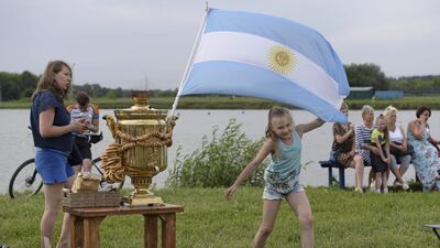 People attend the party organised by the town of Bronnitsy, the location of Argentina's base camp, near Moscow. AFP