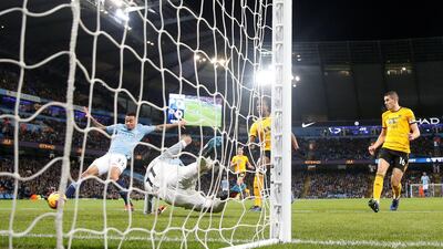 Manchester City's Gabriel Jesus scores their first goal against Wolves. REUTERS