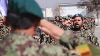 Soldiers with the Afghan National Army (ANA) graduate from basic training during a ceremony at the ANA’s combined fielding centre in Kabul. Scott Olson / Getty / March 18, 2014