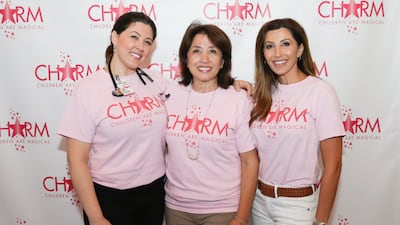 From left, Dr Janette Nesheiwat, Hayat Nesheiwat and founder of Children Are Magical, Jaclyn Stapp, attend the 2018 Charm Back To School Bash in August 2018 in Nashville, Tennessee. Getty Images