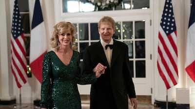 Stewart Bainum, chairman of Choice Hotels International, and Sandra Bainum arrive. EPA