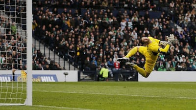 Barry McKay scores the second goal for Rangers as Celtic’s Craig Gordon attempts save. Action Images via Reuters / Russell Cheyne