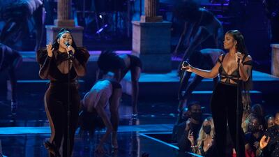 Jazmine Sullivan, left, and JT, of City Girls, perform at the BET Awards. AP