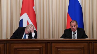 Britain's Foreign Secretary Boris Johnson and his Russian counterpart Sergei Lavrov hold a joint news conference following their meeting, in Moscow, Russia December 22, 2017. REUTERS/Stefan Rousseau