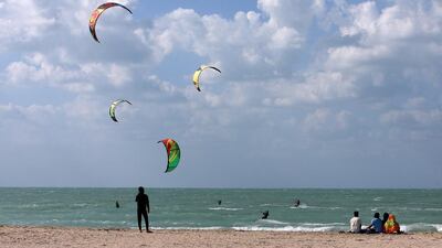 People enjoying their holiday at the Kite Beach in Dubai. Pawan Singh / The National