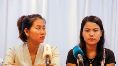 Pan Ei Mon, left, and Chit Su Win, the wives of the jailed Reuters journalists Wa Lone and Kyaw Soe Oo, give a press conference in Yangon. EPA