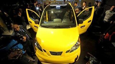 Nissan unveiled the NV200 minivan taxi for New York to a throng of reporters usually associated with a Lamborghini or Ferrari launch. Peter Foley/Bloomberg