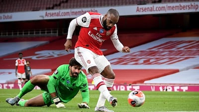 Arsenal's Alexandre Lacazette scores the equaliser. EPA