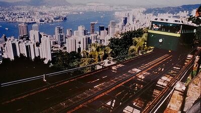 The Peak Tram started operations in 1888, when Hong Kong was a British colony, to transport people up Victoria Peak instead of using sedan chairs. The original carriages were made of varnished timber and seated 30 passengers in three classes. Hong Kong Peak Tramways via AP