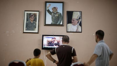 Tarek al-Rifi, center, the father of one of the three children from the Al-Rifi family killed in an Israeli military strike, reacts at Gaza city’s Al-Shifa hospital on August 21, 2014. Three senior Hamas commanders and four children were among at least 15 Palestinians killed in Gaza as Israel stepped up air strikes on day 45 of the bloody conflict. Roberto Schmidt / AFP