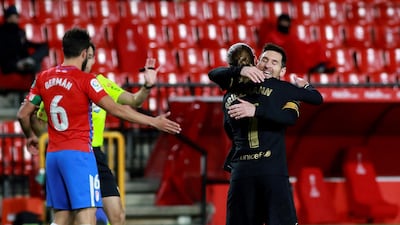 Griezmann (front) celebrates with teammate Lionel Messi. EPA