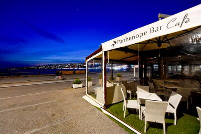 Bar and pizzerias are closed in Naples in an attempt to stop the spread of Covid-19. EPA