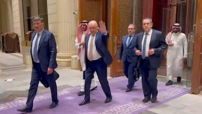 Russian delegation members, including Sergey Beseda, adviser to the head of the FSB, left, and Senator and former diplomat Grigory Karasin, centre, leave the Ritz-Carlton hotel in Riyadh, Saudi Arabia, after talks between Russia and the US on ending the conflict between Russia and Ukraine. EPA
