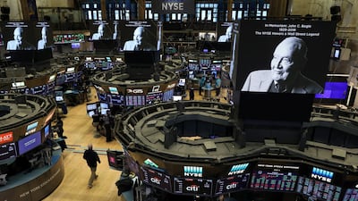 Screens display a tribute to Jack Bogle, founder and retired chief executive of The Vanguard Group, on the floor of the New York Stock Exchange following his death last week. Photo: Reuters