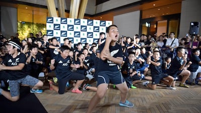 Japanese children perform the Haka during a welcome ceremony for the All Blacks upon their arrival at a hotel in Kashiwa. AFP