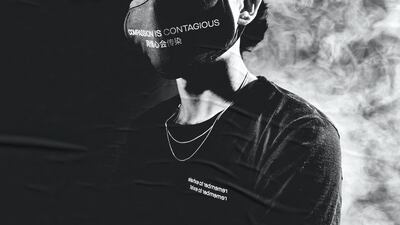 The campaign features models wearing facemasks with the positive message "compassion is contagious". Courtesy of Waleed Shah